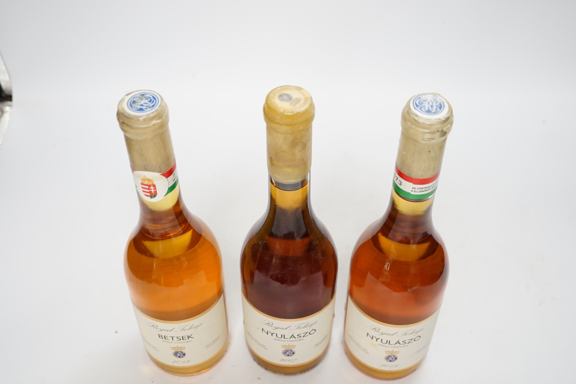 Three bottles of Royal Tokaji singke vineyard 6 puttonyos, each 50cl, Betsek 2013 and Nyulaszo 2007 & 2013.